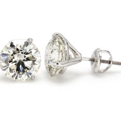 Screw back stud earrings with prong set USA certified D-E/SI2-SI3 round diamonds.  D1.48ct.t.w.