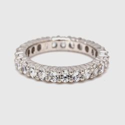 Eternity band with prong set (25) round diamonds.  D1.25ct.t.w.  Size 6