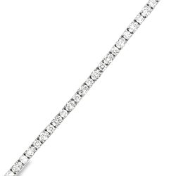 7' Tennis bracelet in 18K WG with basket prong set mixed round and oval diamonds.  D7.47ct.t.w.