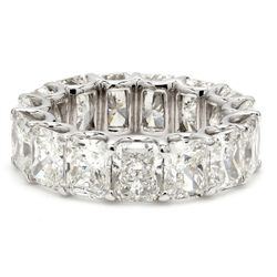Eternity band in platinum with shared claw 4-prong set (17) radiant cut diamonds.  D7.10ct.t.w.  Size 5.75