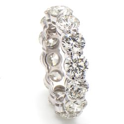 Eternity band in platinum with basket claw set H-I/VS1 (14) round diamonds.  D7.01ct.t.w.  Size 6