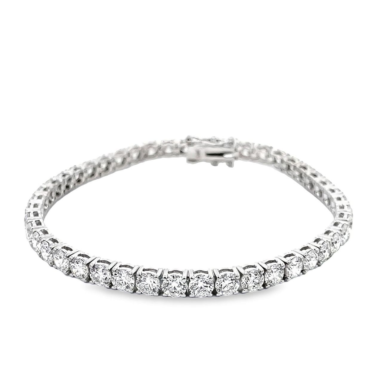 7' Tennis bracelet 18K WG with basket prong set (44) round diamonds.  D10.80ct.t.w.