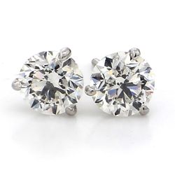 Screw back stud earrings with basket 4-prong set round diamonds.  D3.01ct.t.w.