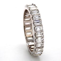 Eternity band in 18K WG with U-prong set (25) emerald cut diamonds.  D2.51ct.t.w.  Size 4.75