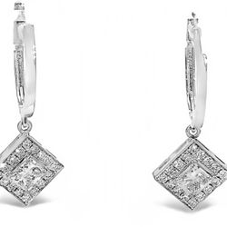 Halo dangling earrings with pave set rounds and prong set princess cut diamond center stones.  D1.19ct.t.w.