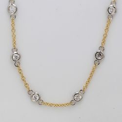 24' Diamonds by the yard necklace in 18K two-tone with bezel set (40) round diamonds.  D1.22ct.t.w.