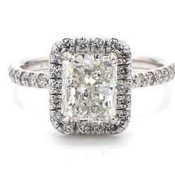 Halo semi-mount in platinum with round diamonds.  D0.46ct.t.w.  Size 6.75