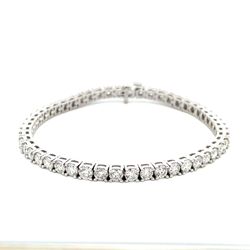 7' Tennis bracelet in platinum with 4-prong basket set (46) round diamonds.  D10.98ct.t.w.