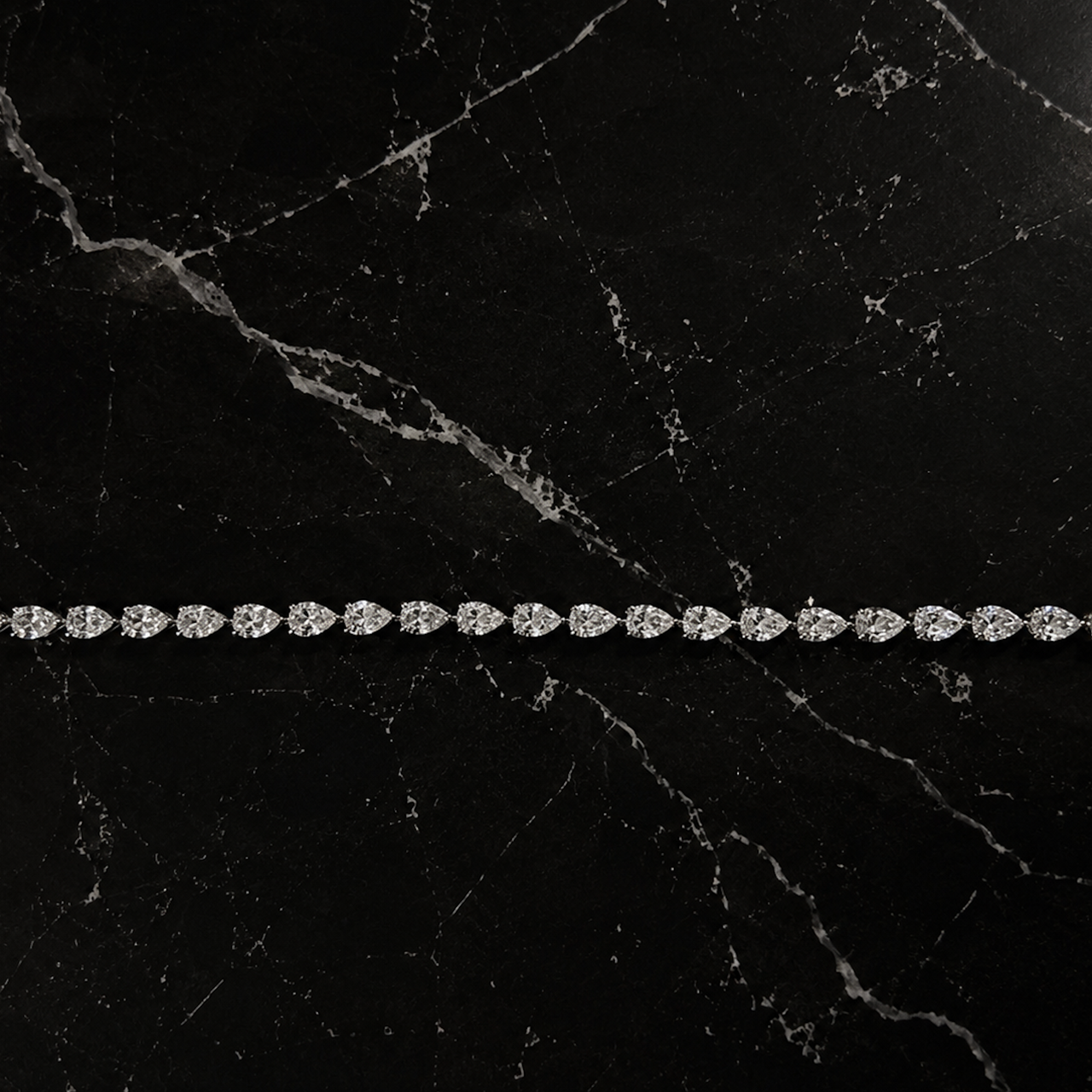 NATURAL DIAMOND PEAR TENNIS BRACELET