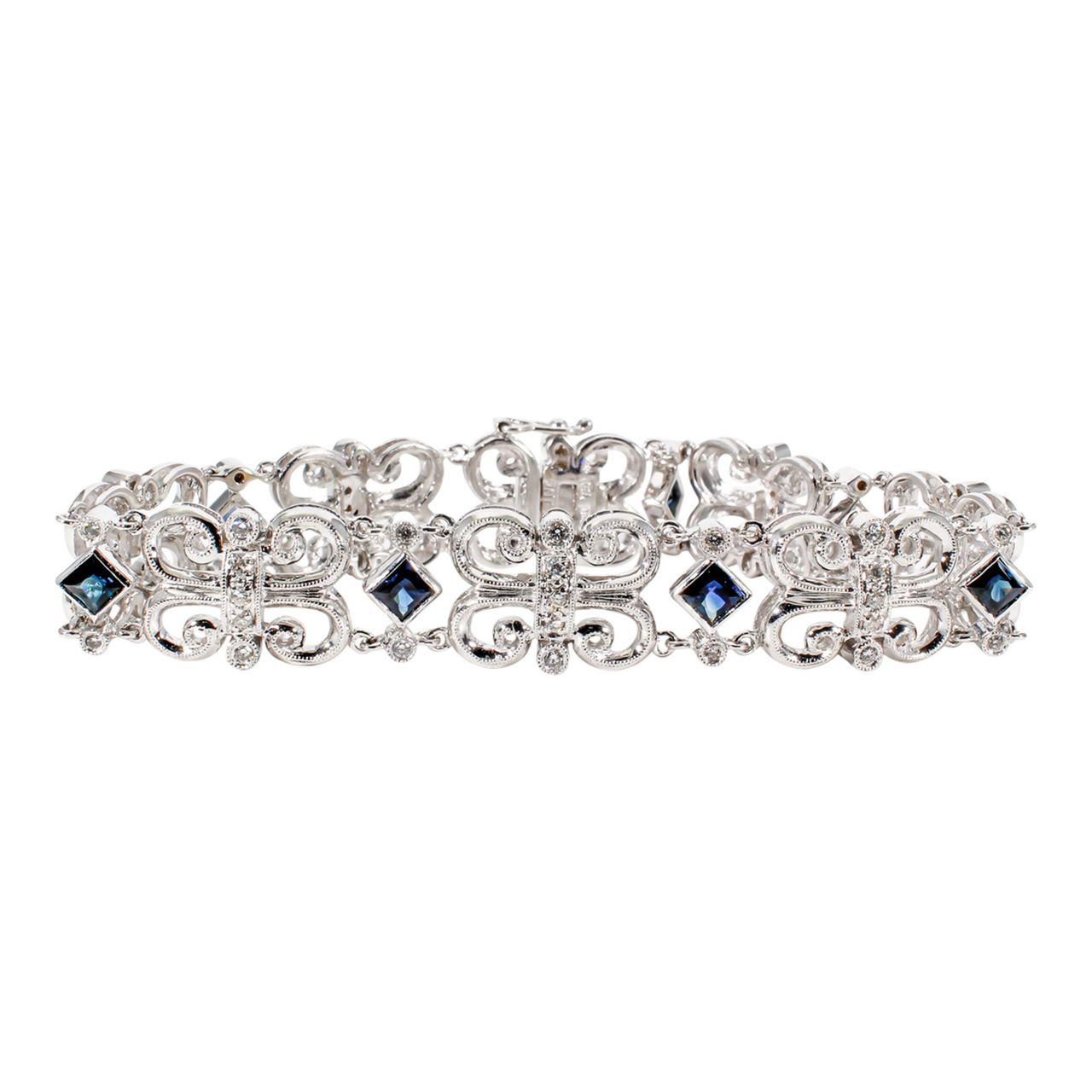 7' Butterfly links bracelet in 18K WG with round diamonds & sapphires.  D0.63ct.t.w.  Sapphires 2.37ct.t.w.