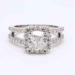 Halo split-shank semi-mount with pre-set round diamonds.  D0.89ct.t.w.  Size 6