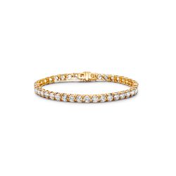 7' Tennis bracelet in yellow gold with basket prong set (42) round diamonds.  D10.01ct.t.w.