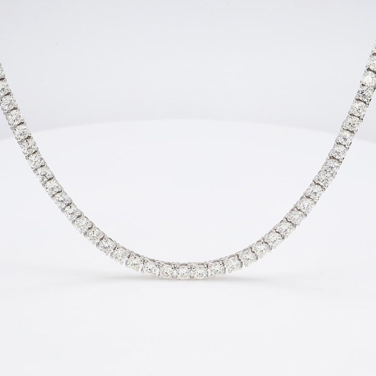 20' Straight tennis necklace with 4-prong set round diamonds.  D15.16ct.t.w.