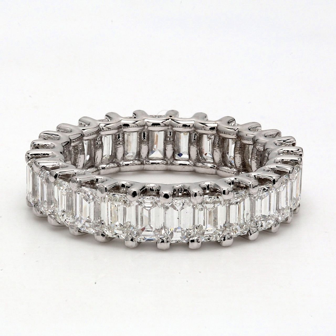 Eternity band in 18K YG with U-prong set (26) emerald cut diamonds.  D4.22ct.t.w.  Size 5.25