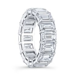 Eternity band in platinum with prong set (23) emerald cut diamonds.  D5.39ct.t.w.  Size 5