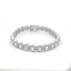 7' Halo tennis bracelet with rounds around (26) emerald cut diamond centerstones.  D8.42ct.t.w.
