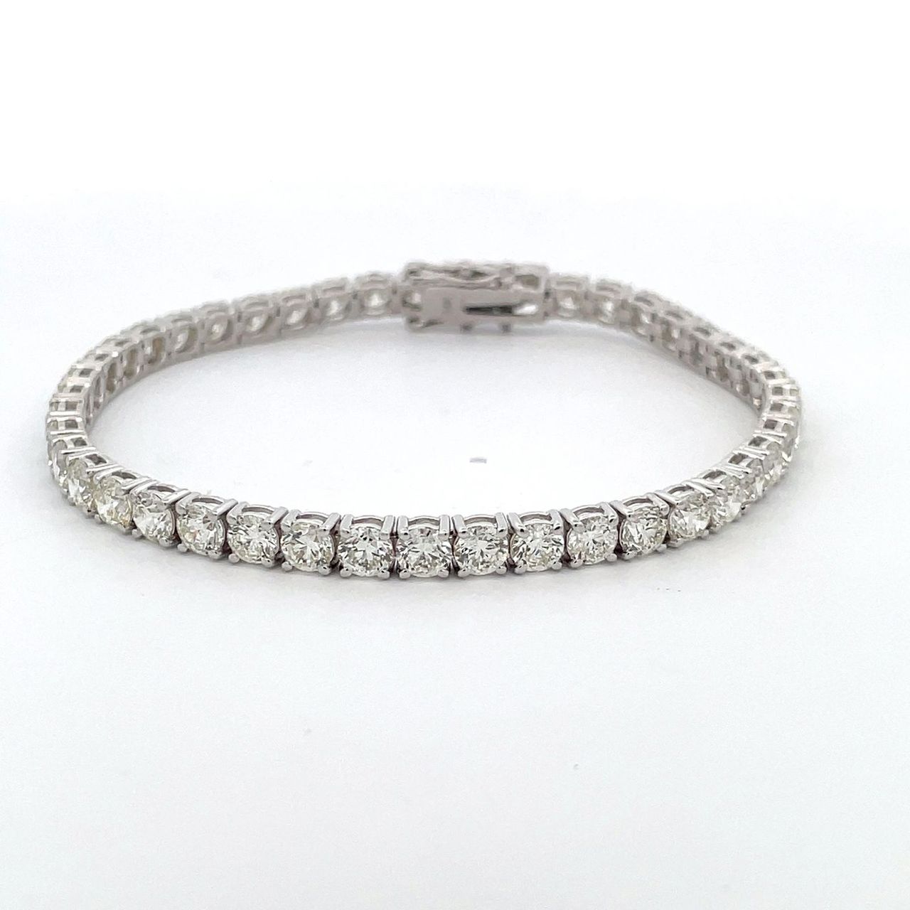 7' Tennis bracelet with 4-prong open basket set (44) round diamonds.  D11.69ct.t.w.