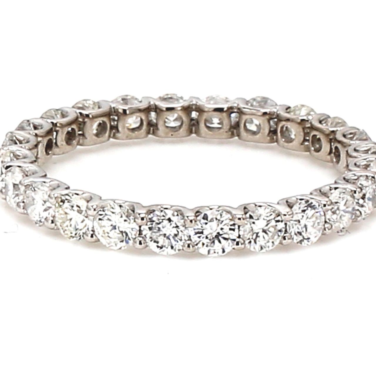 Eternity band in 18K WG with U-prong set (24) round diamonds.  D2.13ct.t.w.  Size 9