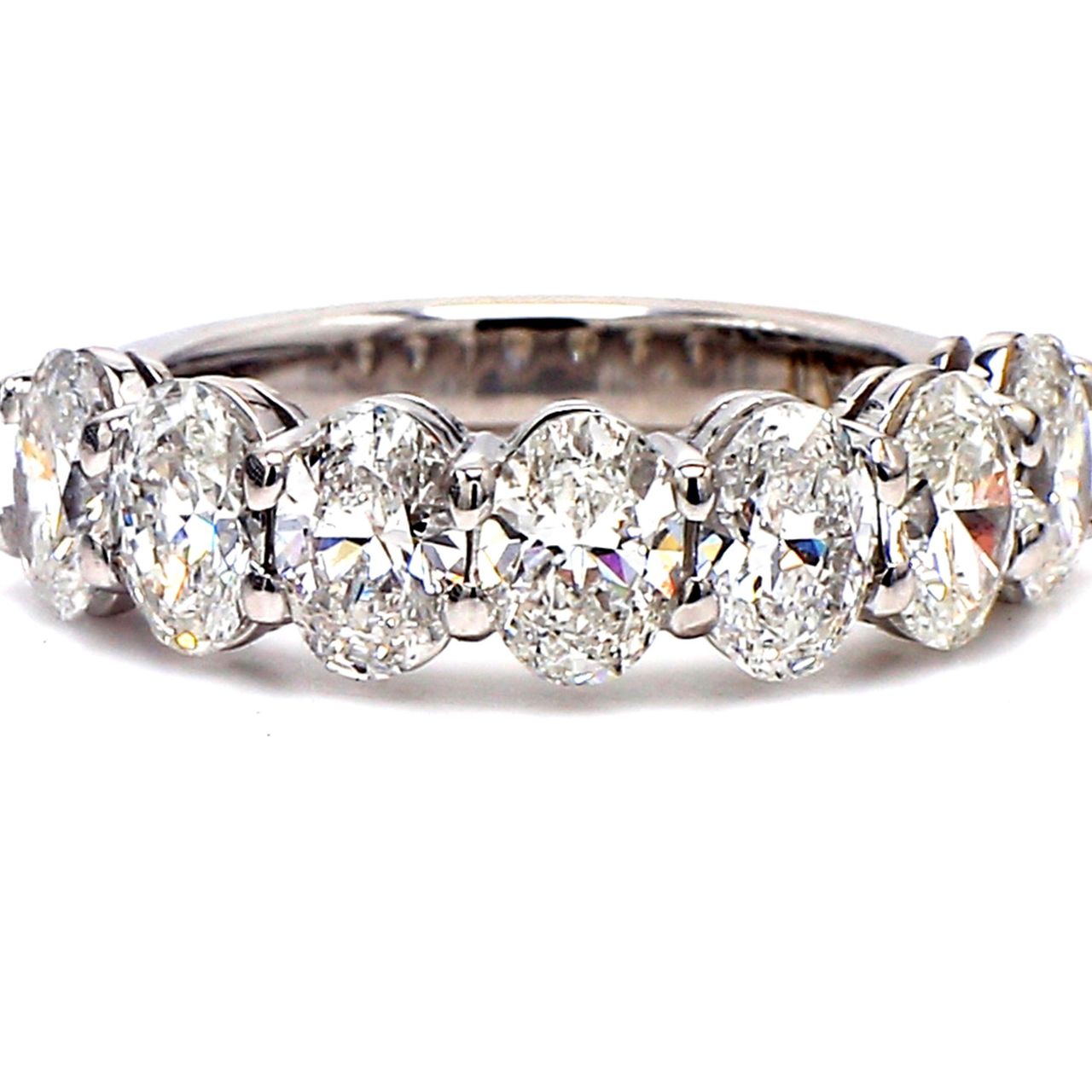 7-stone band in platinum with basket prong set oval cut diamonds.  D2.17ct.t.w.  Size 6