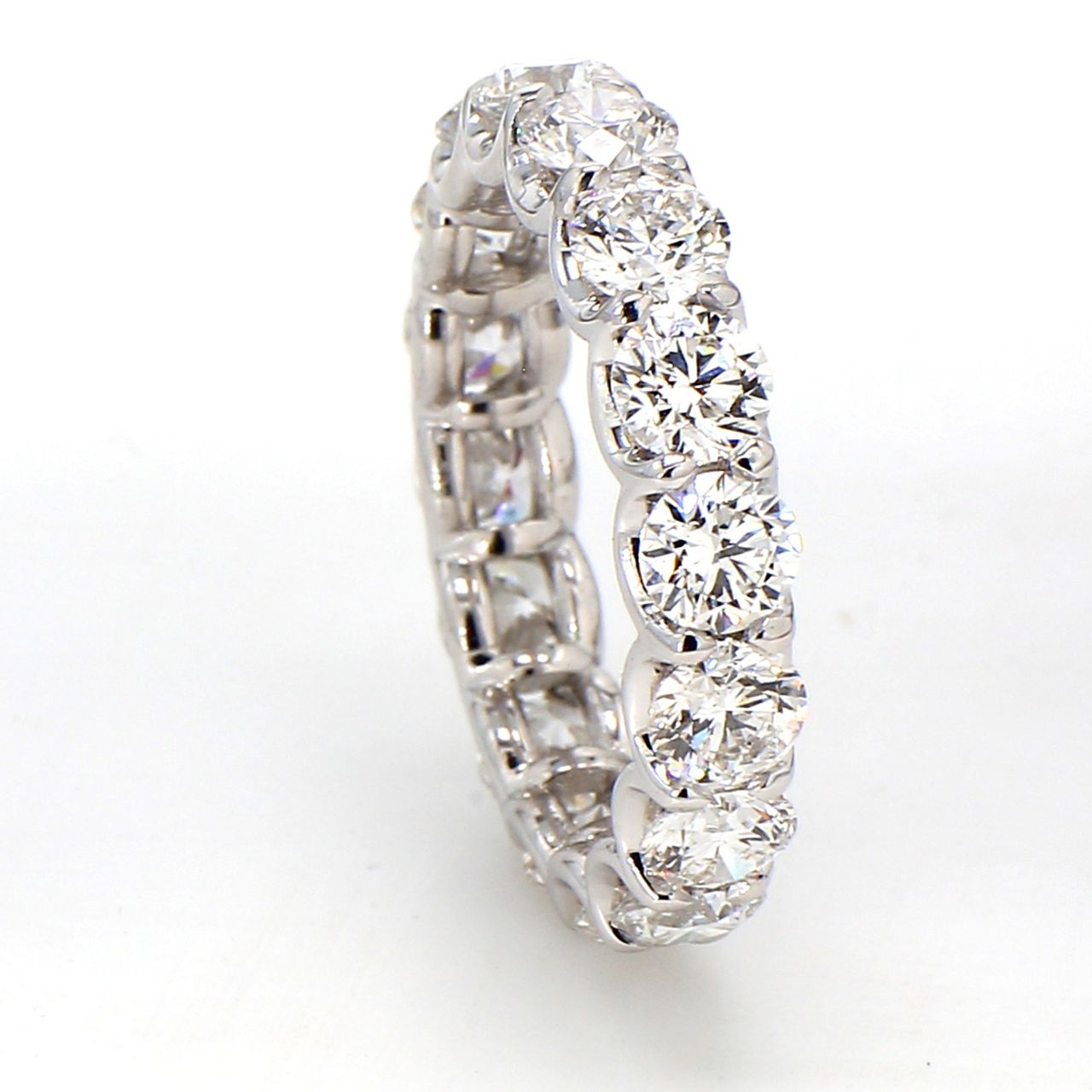 Eternity band in platinum with U-prong set (16) round diamonds.  D3.93ct.t.w.  Size 6