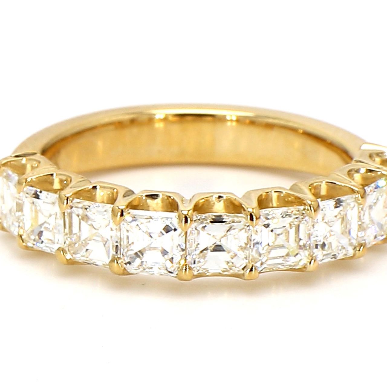9-stone band in 18K YG with U-prong set asscher cut diamonds.  D1.98ct.t.w.  Size 7.5
