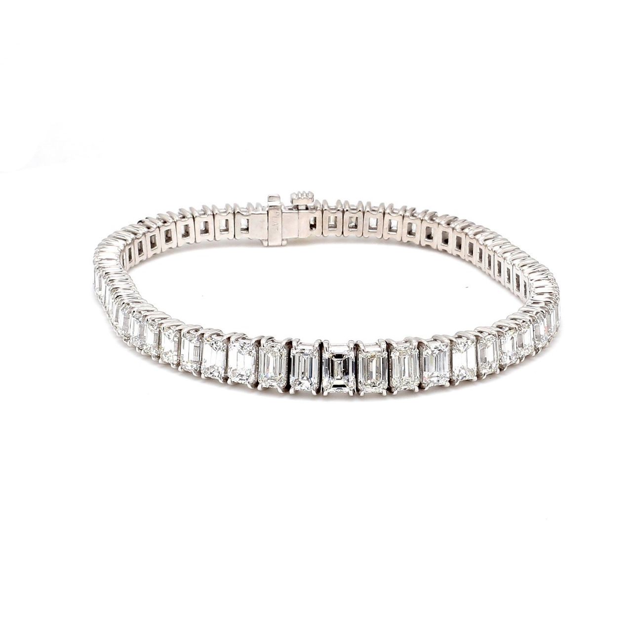 7' Graduated tennis bracelet in platinum with 4-prong basket set F-G/VS-SI emerald cut diamonds.  D13.52ct.t.w.  (Center 0.50ct.)