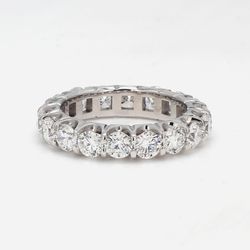 Eternity band in platinum with U-prong set (18) round diamonds.  D3.32ct.t.w.  Size 5.5