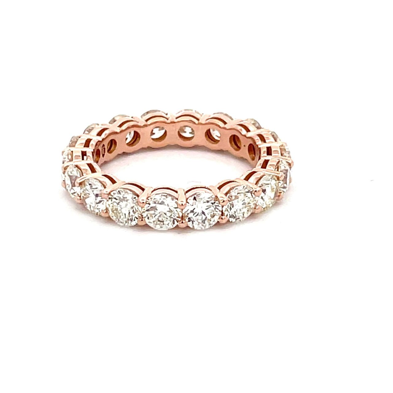 Eternity band in 18K RG with basket shared prong set (18) round diamonds.  D4.35ct.t.w.  Size 7.25