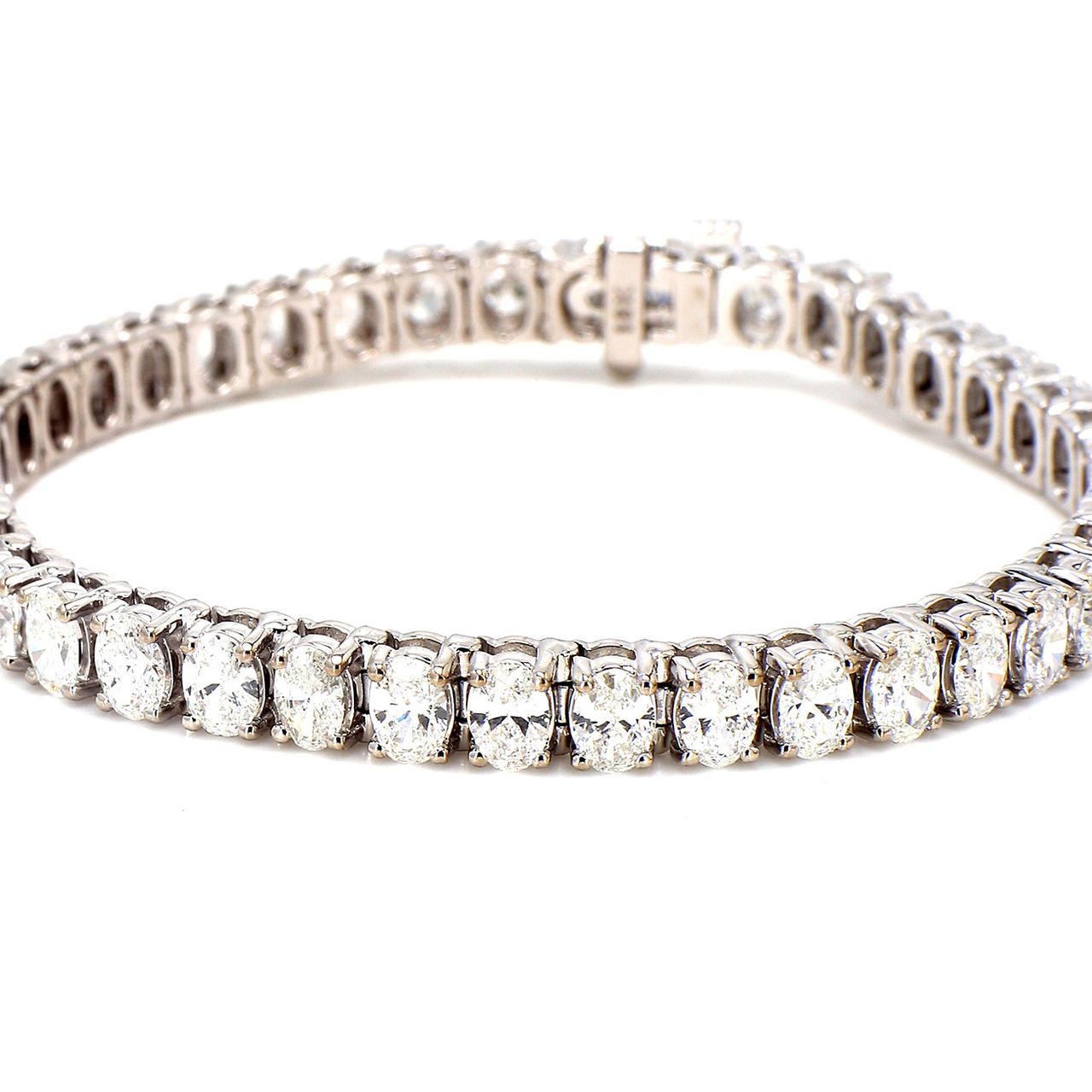 7' Tennis bracelet in 18K WG with prong set (41) oval cut diamonds.  D10.85ct.t.w.