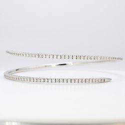 Flexible bangle in 18K WG with 4-prong set round diamonds.  D2.28ct.t.w.