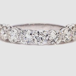 9-stone band in platinum with basket prong set round diamonds.  D2.18ct.t.w.  Size 5