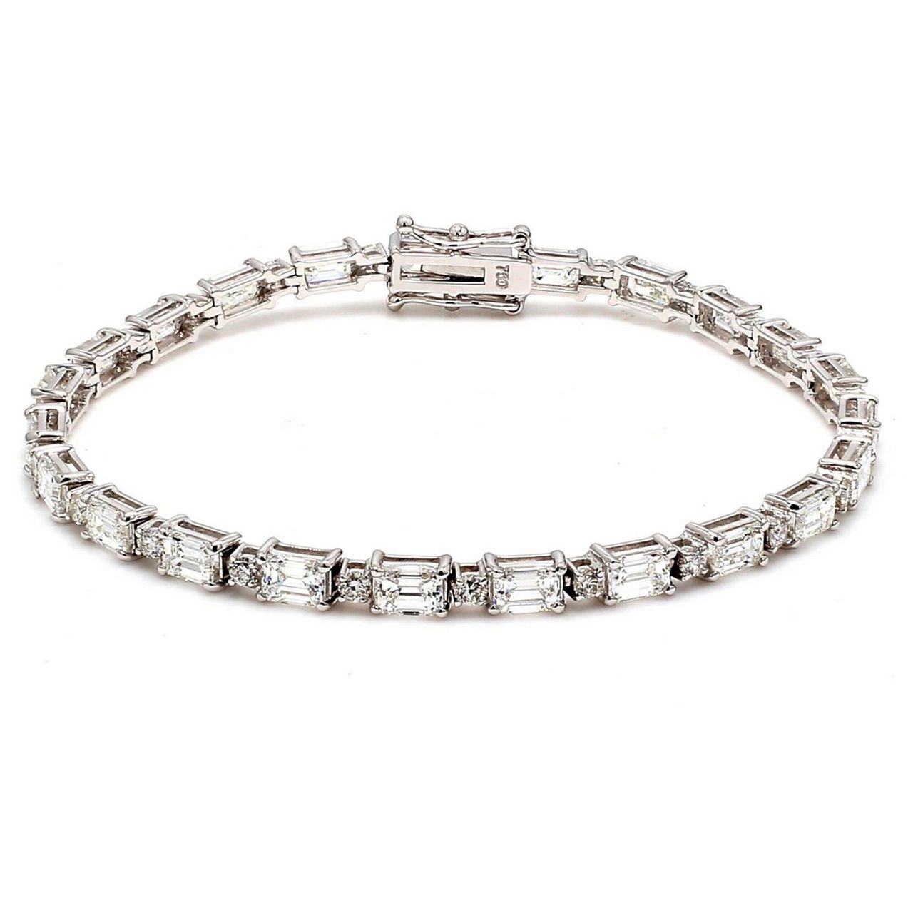 7' Tennis bracelet in 18K WG with alternating 4-prong set (23) round and (23) emerald cut diamonds.  D8.12ct.t.w.