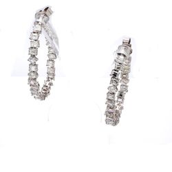 1.5' Inside out hoop earrings in 18K WG with prong set emerald cut diamonds.  D7.29ct.t.w.