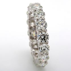 Eternity band in platinum with U-prong set (16) round diamonds.  D3.18ct.t.w.  Size 6