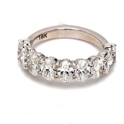 9-stone band in 18K WG with basket prong set oval cut diamonds.  D2.50ct.t.w.  Size 5.5