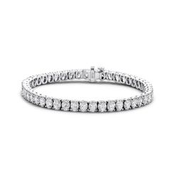 7' Tennis bracelet in platinum with 4-prong set oval diamonds.  D11.15ct.t.w.