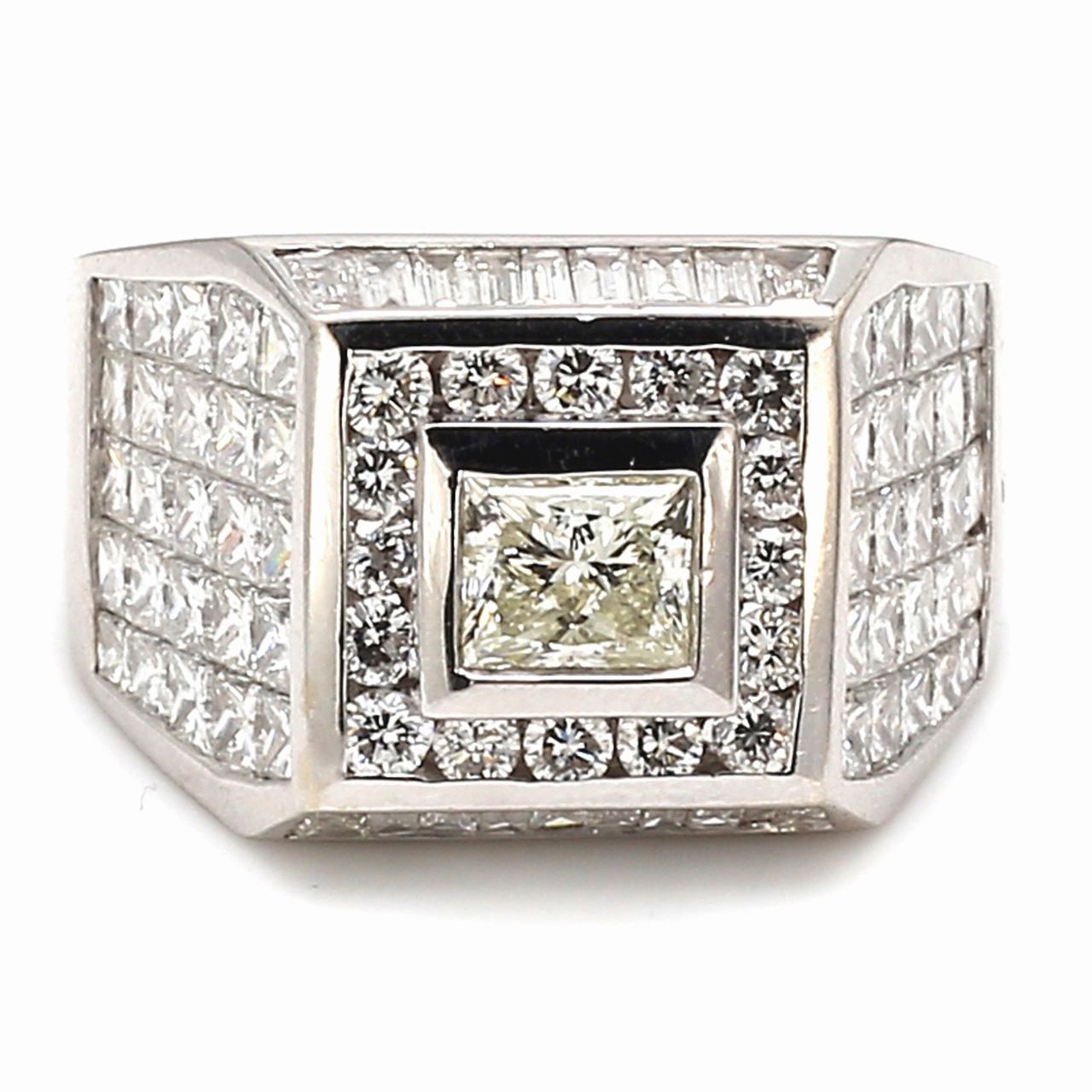 Ring w/ 5x5 invisible set princess cuts, channel set baguettes, rounds around bezel set princess cut center stone.  D6.71ct.t.w.  (Center - 1.01ct.)