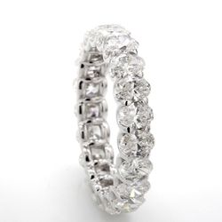 Eternity band with shared U-prong set E-F/VS+ (21) oval diamonds.  D3.01ct.t.w.  Size 5.75