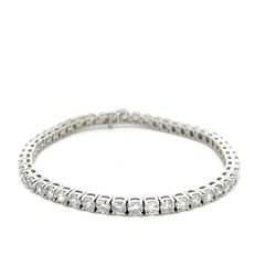 7' Tennis bracelet with basket 4-prong set (50) round diamonds.  D9.50ct.t.w.