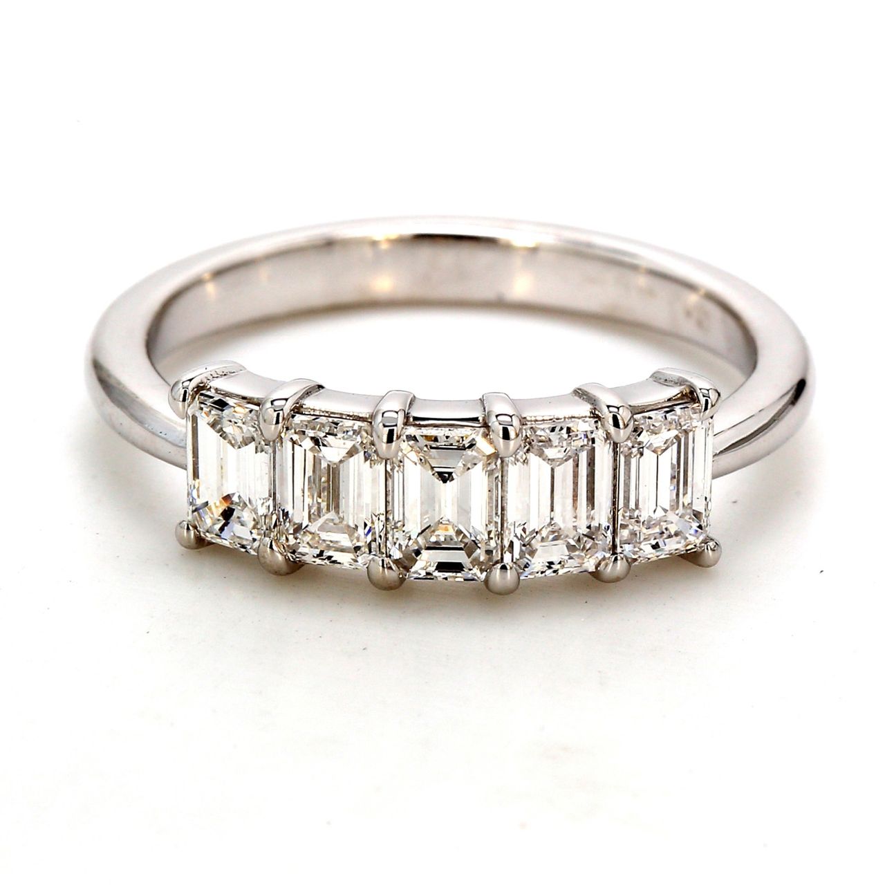 5-stone band in platinum with shared prong set emerald cut diamonds.  D1.43ct.t.w.  Size 7.25