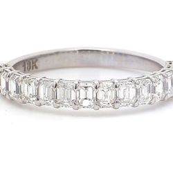 14-stone band in 18K WG with prong set emerald cut diamonds.  D1.21ct.t.w.  Size 6.25