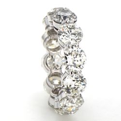 Eternity band in platinum with basket prong set (12) round diamonds.  D12.02ct.t.w.  Size 7.25
