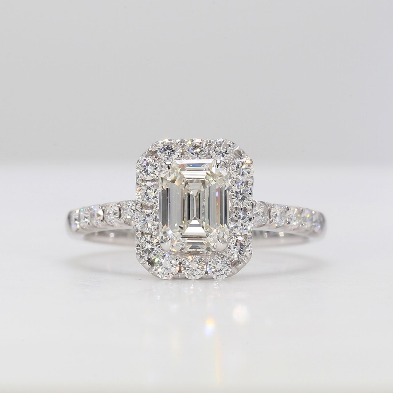 Halo semi-mount in 18K WG with french pave set round diamonds.  D0.53ct.t.w.  Size 6.5