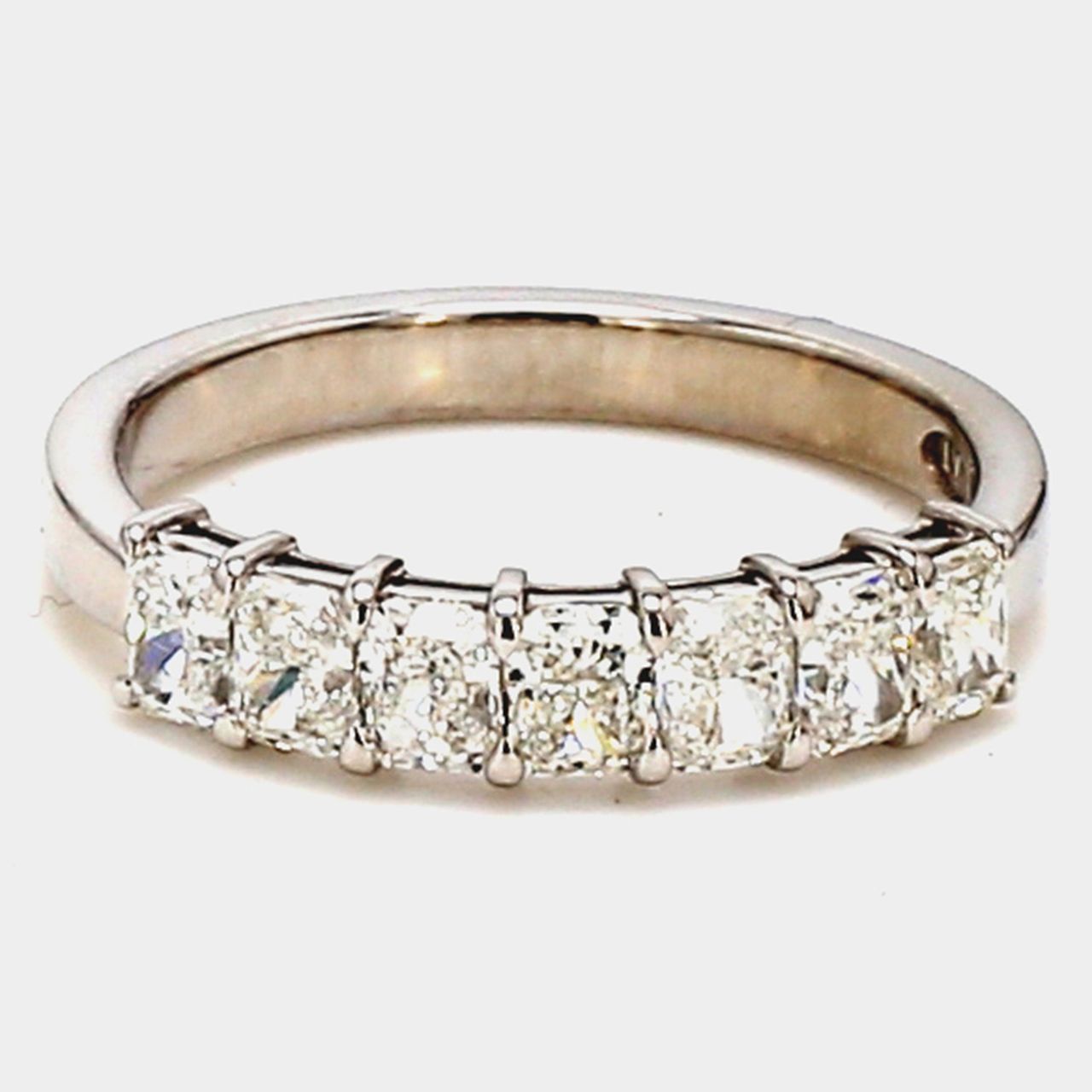 7-stone band in platinum with basket prong set radiant cut diamonds.  D1 00ct.t.w.  Size 5.5