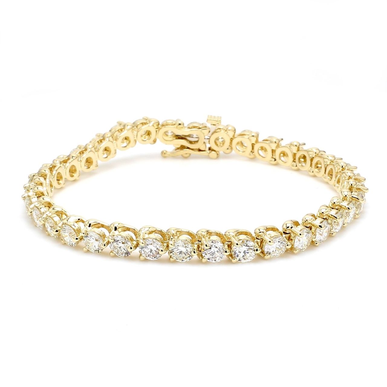 7' Tennis bracelet in yellow gold with 3-prong set (35) round diamonds.  D9.50ct.t.w.