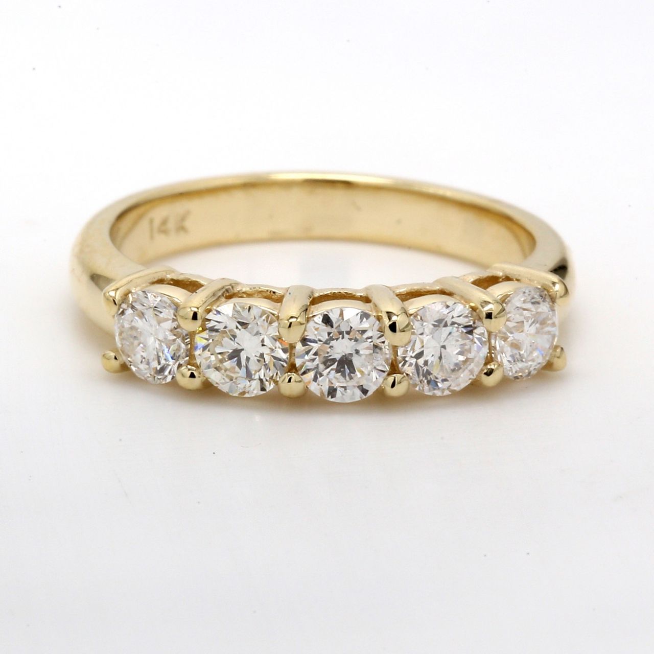 5- stone band in 14K YG with shared U-prong set round diamonds.  D1.17ct.t.w.  Size 6.5