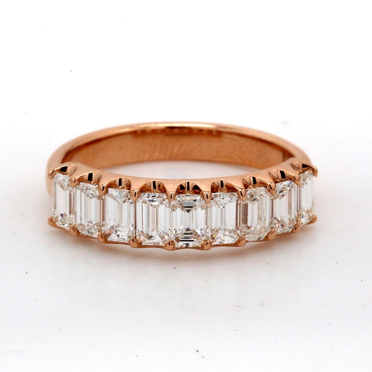 9-stone band in 18K RG with U-prong set emerald cut diamonds.  D1.11ct.t.w.  Size 5.5