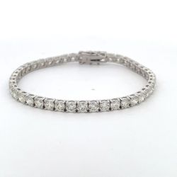 7' Tennis bracelet with 4-prong open basket set (44) round diamonds.  D11.69ct.t.w.