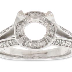 Halo split shank semi-mount with pave set round diamonds.  D0.59ct.t.w.