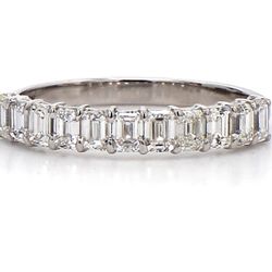 11-stone band with basket prong set emerald cut diamonds.  D1.03ct.t.w.  Size 6.25